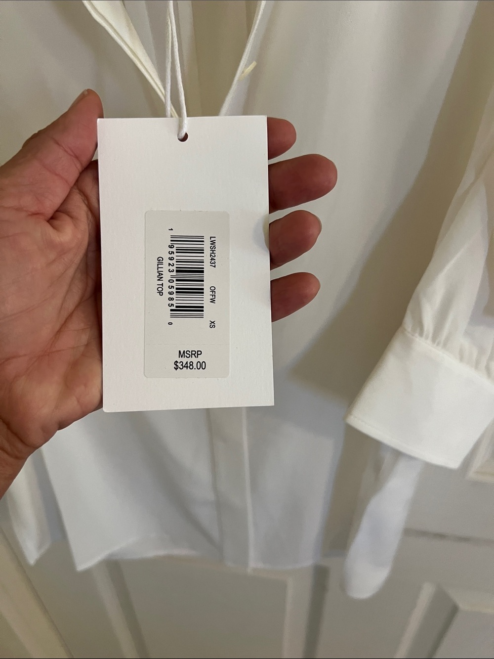 FRAME Gillian silk blouse in white with ruched puff sleeves. - Picture 7 of 7